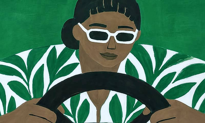 Illustration of a person holding a steering wheel, with a green and white palm leaf pattern clothing.